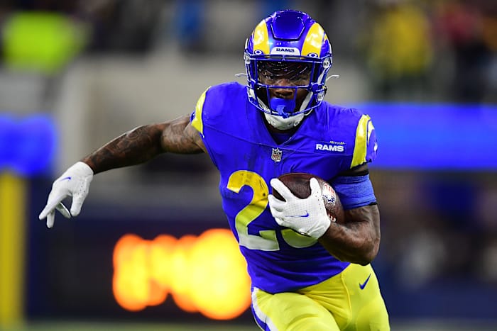 Jan 17, 2022; Inglewood, California, USA; Los Angeles Rams running back Cam Akers (23) runs the ball against the Arizona Cardinals during the second half in the NFC Wild Card playoff football game at SoFi Stadium. Mandatory Credit: Gary A. Vasquez-USA TODAY Sports